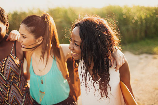 istock Smiling girlfriends enjoying in a summertime 544717956