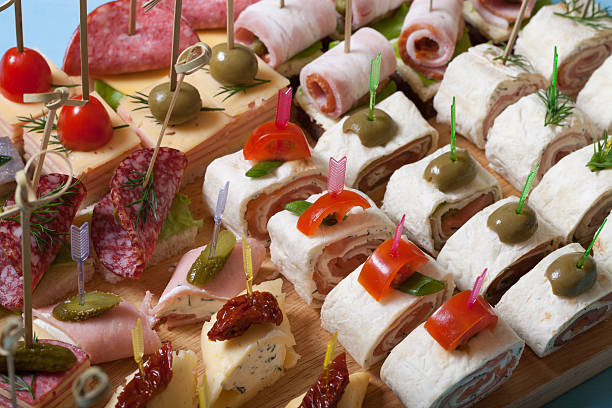 istock Different kinds of snacks canape on skewers. Selective focus 544718252