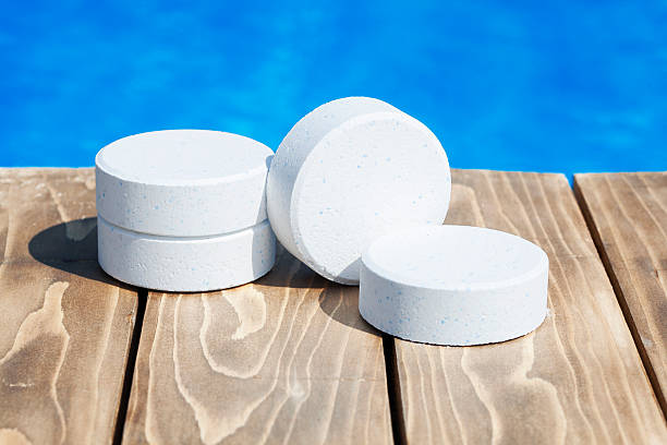 Pool chlorine tablets Pool chlorine tablets chlorine stock pictures, royalty-free photos & images