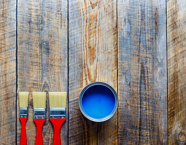 istock concept preparation for painting with can of blue paint 544718896