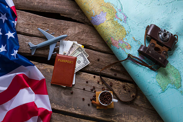 istock Brown passport and US flag. 544719350