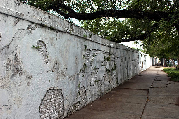 Whitewashed Wall around Lafayette Cemetery, Garden District, New Orleans stock photo