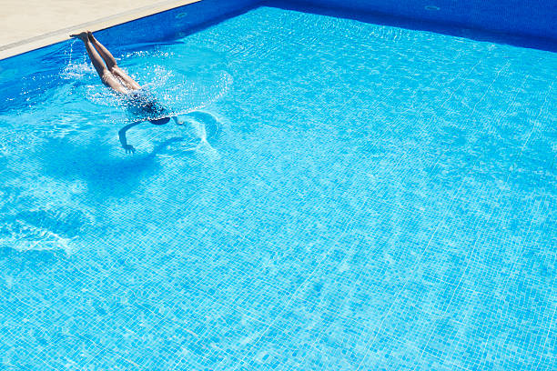 istock Young Women is Swimming in the Pool 544721554