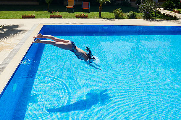 istock Young Women is Swimming in the Pool 544721836