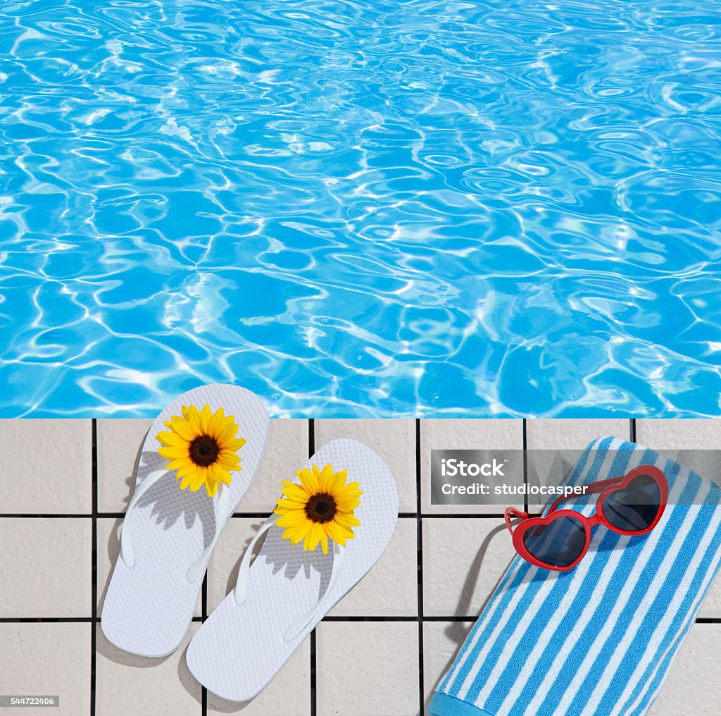 Image of the resort poolside Flip Flops by Pool Blank Stock Photo