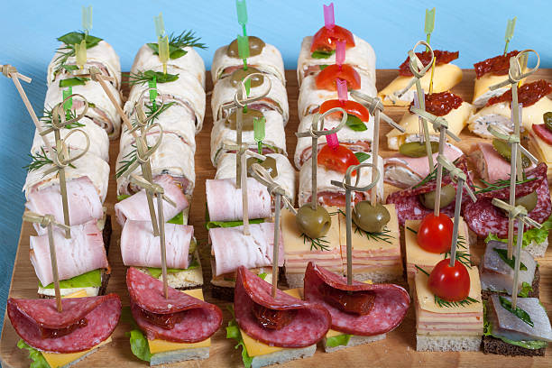 istock Different kinds of snacks canape on skewers 544723368