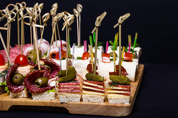 istock Different kinds of snacks canape on skewers 544723410