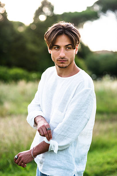istock fashionable young adult posing serious 544725832