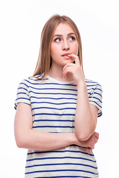 istock Thinking girl on white background. People emotion concept 544726066