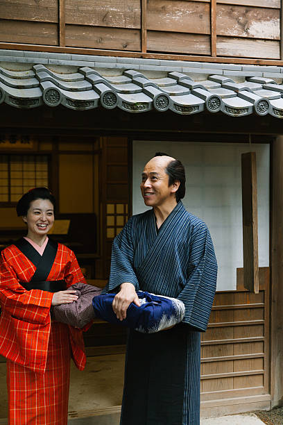 istock The Japanese couple talking at gareage  in Edo perioud. 544726342