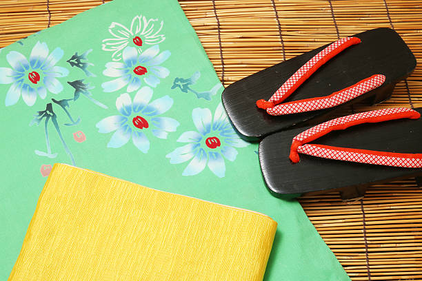 Japanese yukata, obi, and sandals. Japanese yukata, band, and sandals. Concept of Japanese summer. geta sandal photos stock pictures, royalty-free photos & images