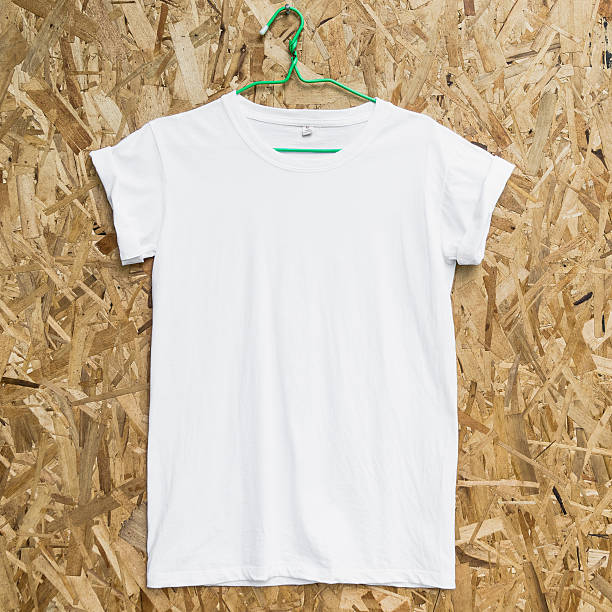 istock Blank white T-shirt on wood background 544729578