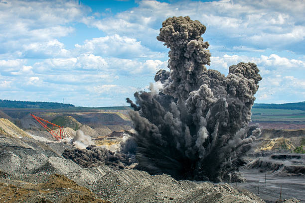 Explosure on open pit Explosive works on a coal mine open pit quarry photos stock pictures, royalty-free photos & images