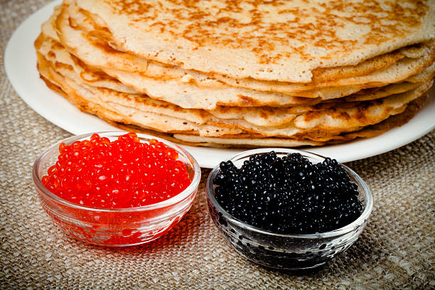 istock Russian pancakes - blini with red and black caviar 544730838