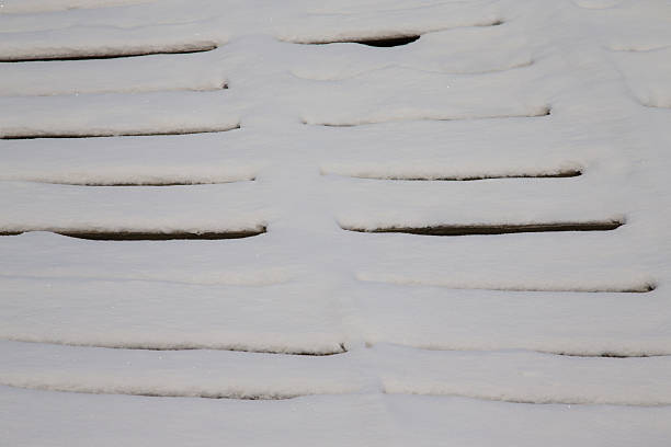 istock Snow covered detail of rustic house. Selective focus 544731390