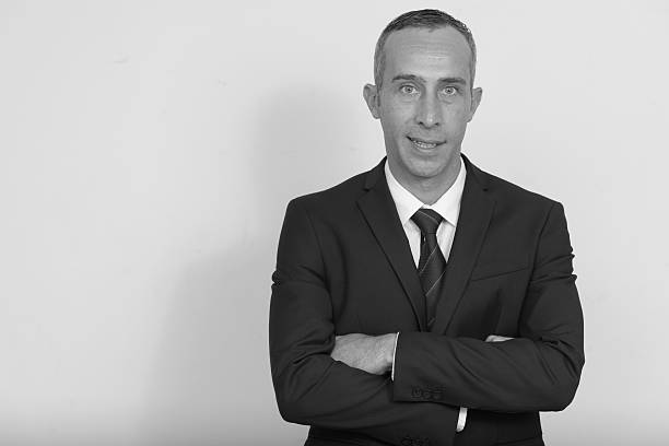 istock Black and white studio portrait of businessman 544731910