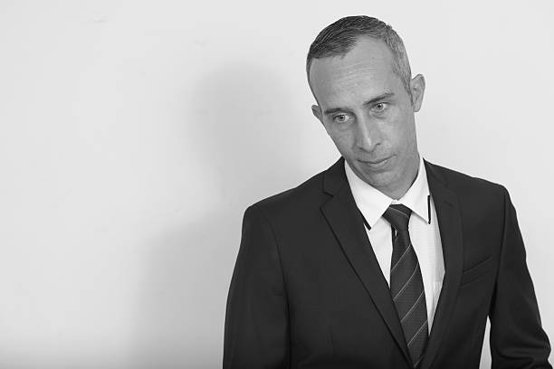 istock Black and white studio portrait of businessman 544731942