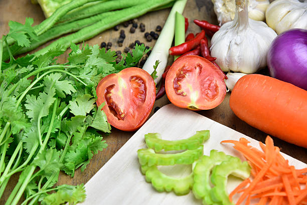 istock Tomato and Organic vegetables on a wooden background 544734980