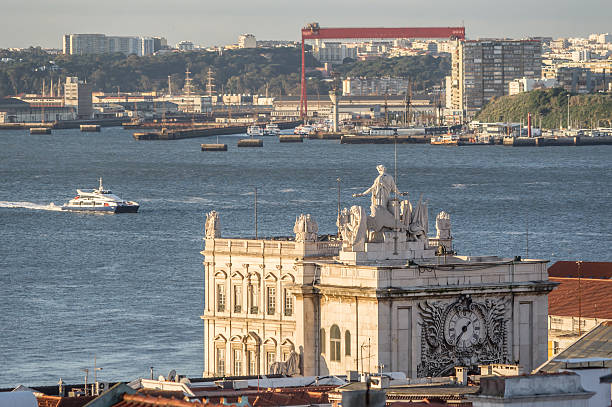 istock Old city roofs, industrial district and river Tag, Lisbon 544740188