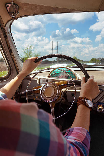 istock girl and retro car 544740888