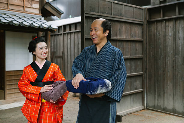 istock The Japanese couple talking at gareage  in Edo perioud. 544741840