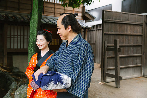 istock The Japanese couple talking at gareage  in Edo perioud. 544741876