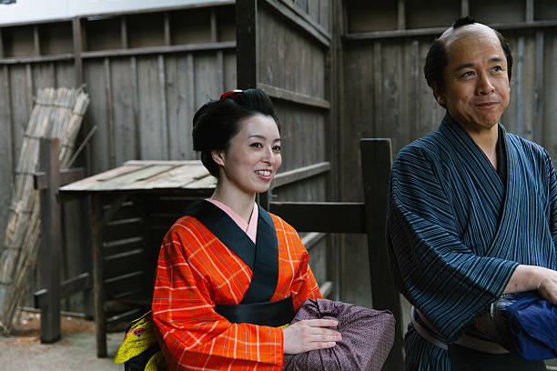 istock The Japanese couple talking at gareage  in Edo perioud. 544741946