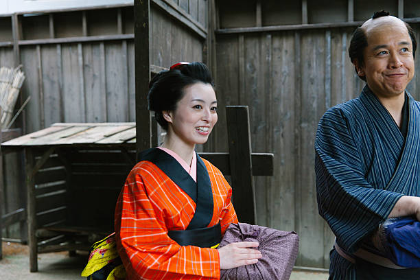 istock The Japanese couple talking at gareage  in Edo perioud. 544741978