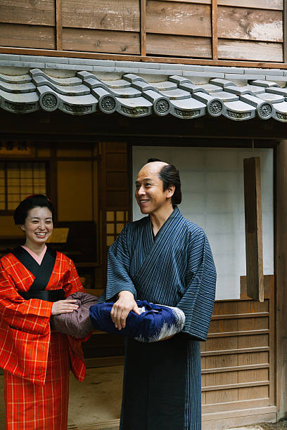istock The Japanese couple talking at gareage  in Edo perioud. 544742022
