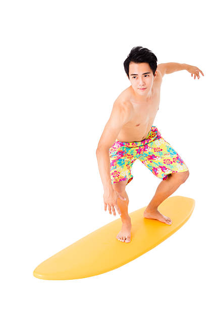 istock Young man with surfboard isolated on white 544745922