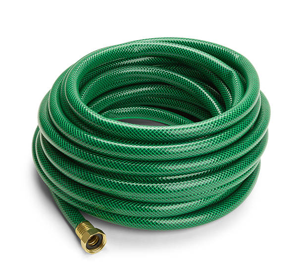 Garden Hose Green Garden Hose Rolled Up Isolated on a White Background. water hose stock pictures, royalty-free photos & images