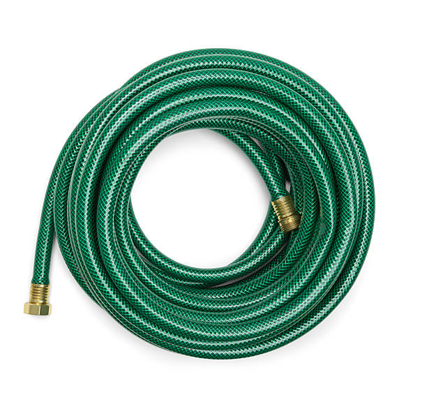 green garden hose - tuinslang stockfoto's en -beelden