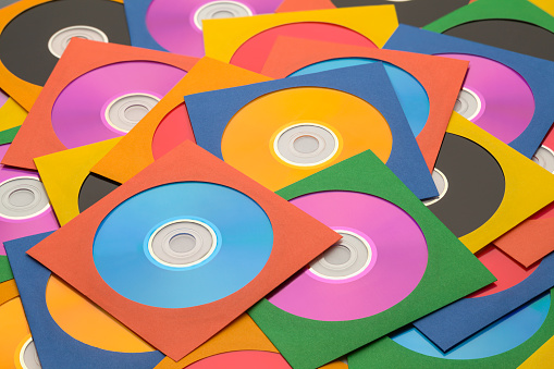 Many Discs in Cases in a large Messy Pile.