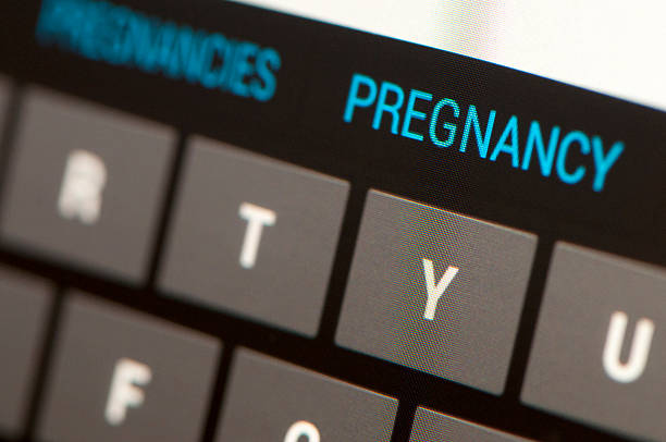 istock Pregnancy word on Cyber Keyboard 544750562