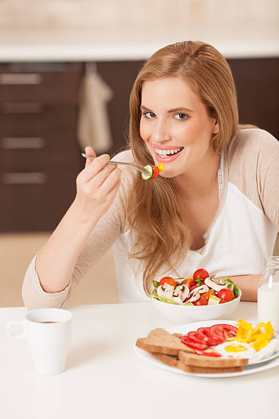 istock Woman eating nutritious meal. 544752832