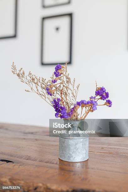 Flowers Bouquet On Shelf In Front Of Wooden Wall Stock Photo - Download Image Now - Backgrounds, Bouquet, Celebration