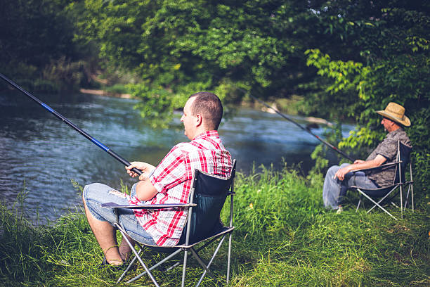 istock people fishing on the river 544793668