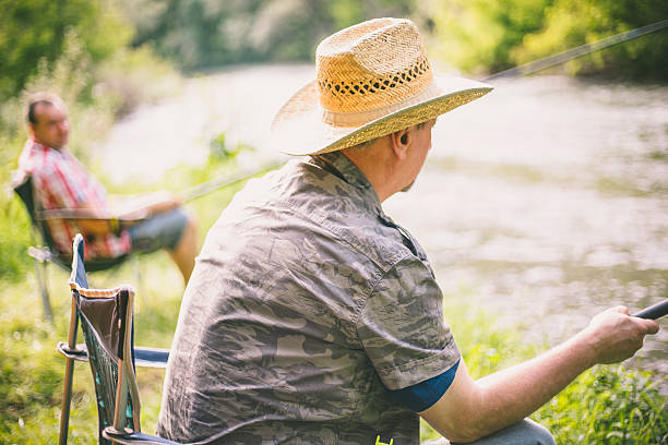 istock people fishing on the river 544793816