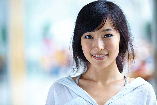 istock pretty Asian college student portrait 544794414