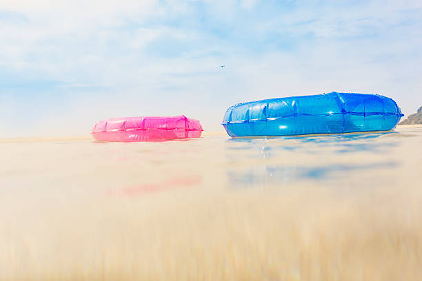 istock rubber rings floating on sea surface on a bright day 544794856