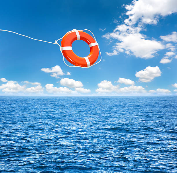 ライフ浮き袋 抱えて、特典を空中には、海からの救出 - nobody inflatable equipment rope ストックフォトと画像