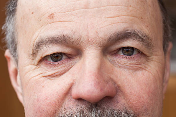 istock Face of old man without emotions 544800108