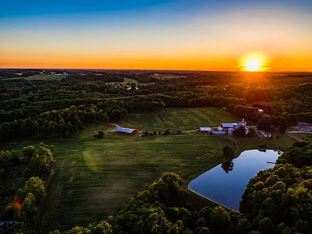 Stunning Aerial view over a farm in the country parts of Ohio
