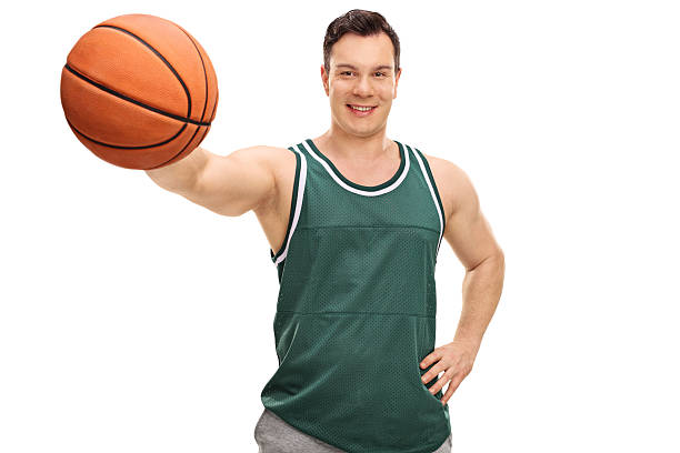 istock Young guy holding a basketball 544802028