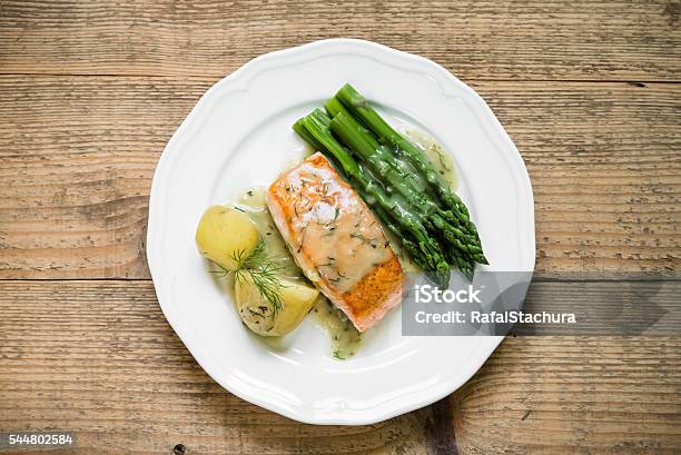 Grilled Salmon With Boiled Potatoes And Asparagus Top View Stock Photo - Download Image Now