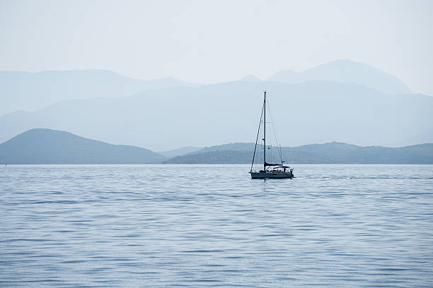 istock Sailing boat in the morning in Corfu, Greece 544804980
