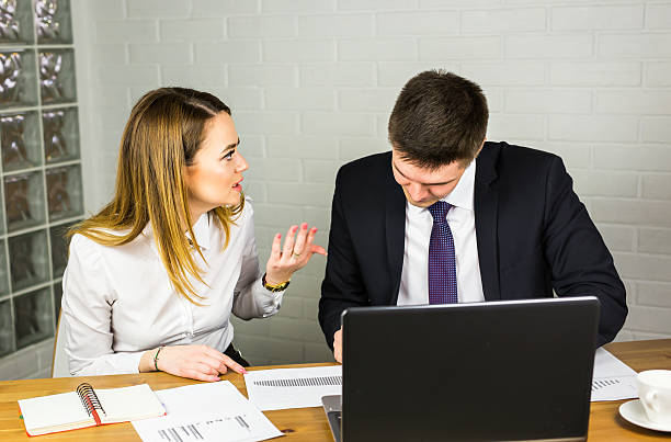 istock Business people discussing ideas at meeting using laptop in the 544805028