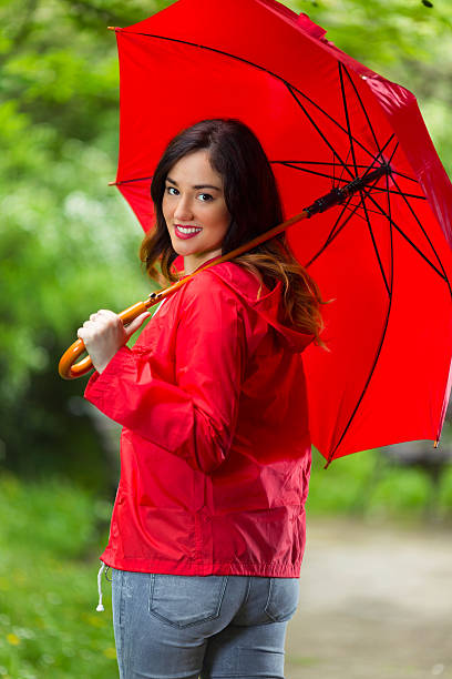 istock Woman with Red Umbrella 544806720