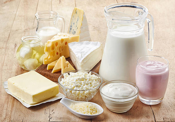 Various fresh dairy products Various fresh dairy products on wooden background cheese stock pictures, royalty-free photos & images