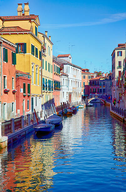 Scenic view of canal with Rio de San Pantalon at the old town of Venice on a sunny summer day. Photo taken August 7th, 2023, Venice, Italy.